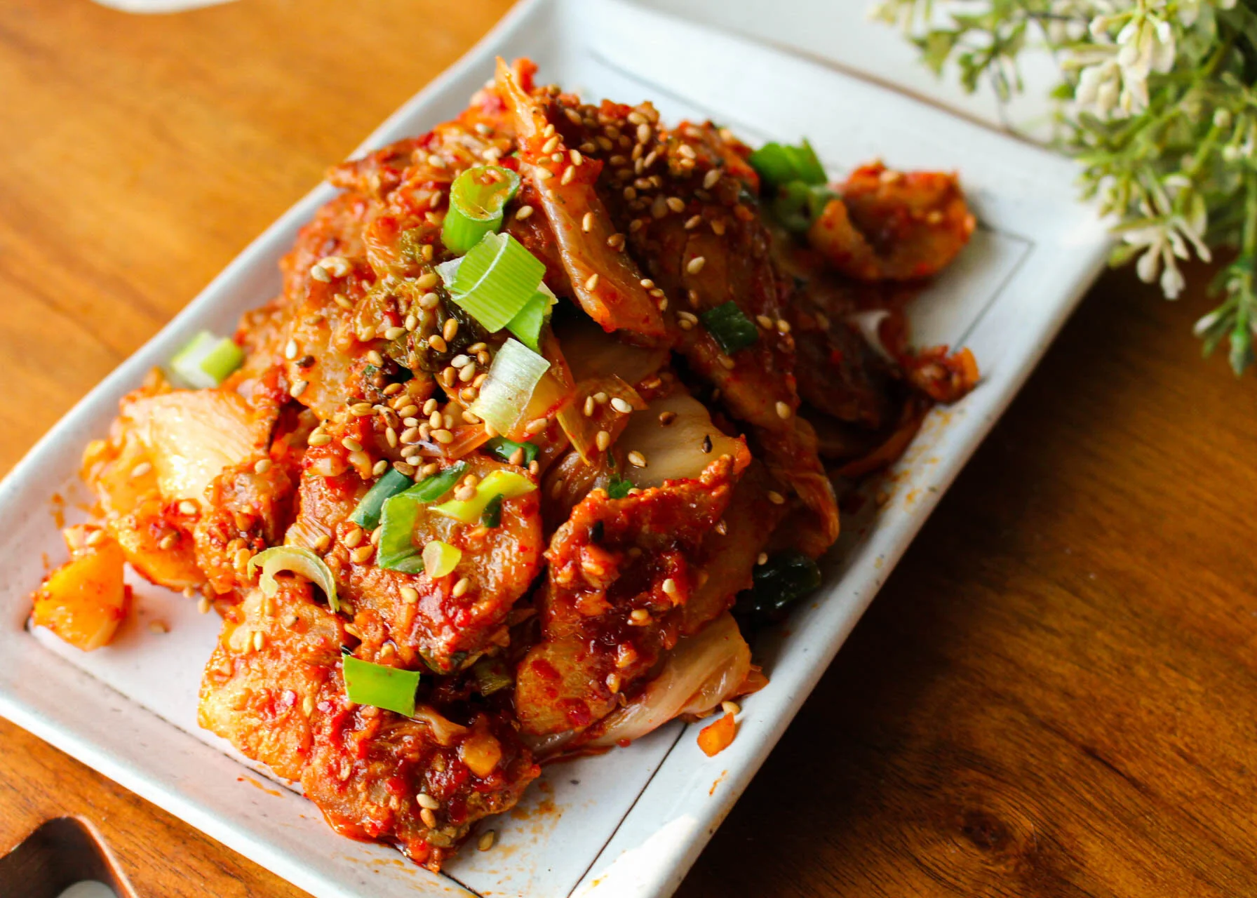 Samgyeopsal kimchi bokum with pork belly and kimchi